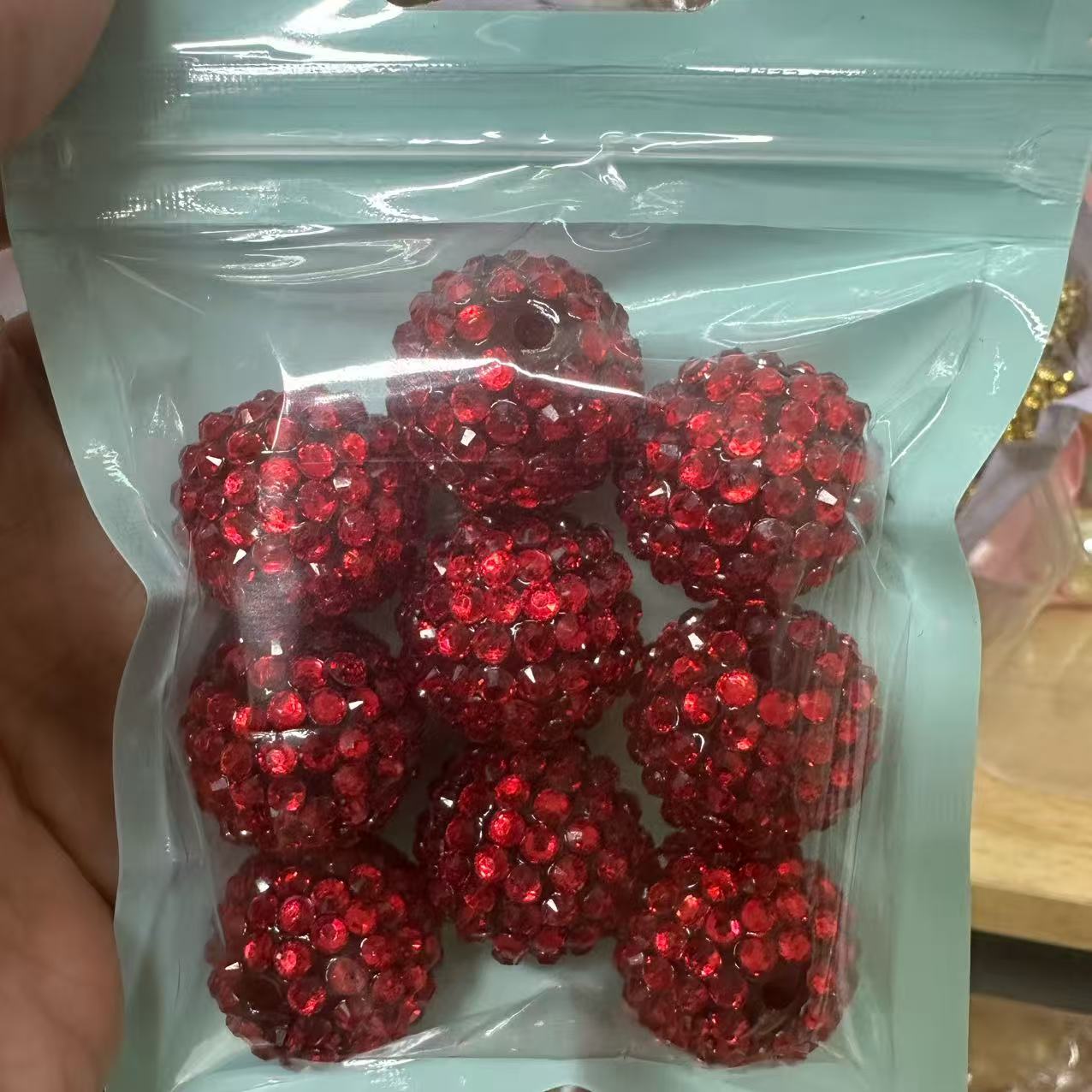 Red glittering beads